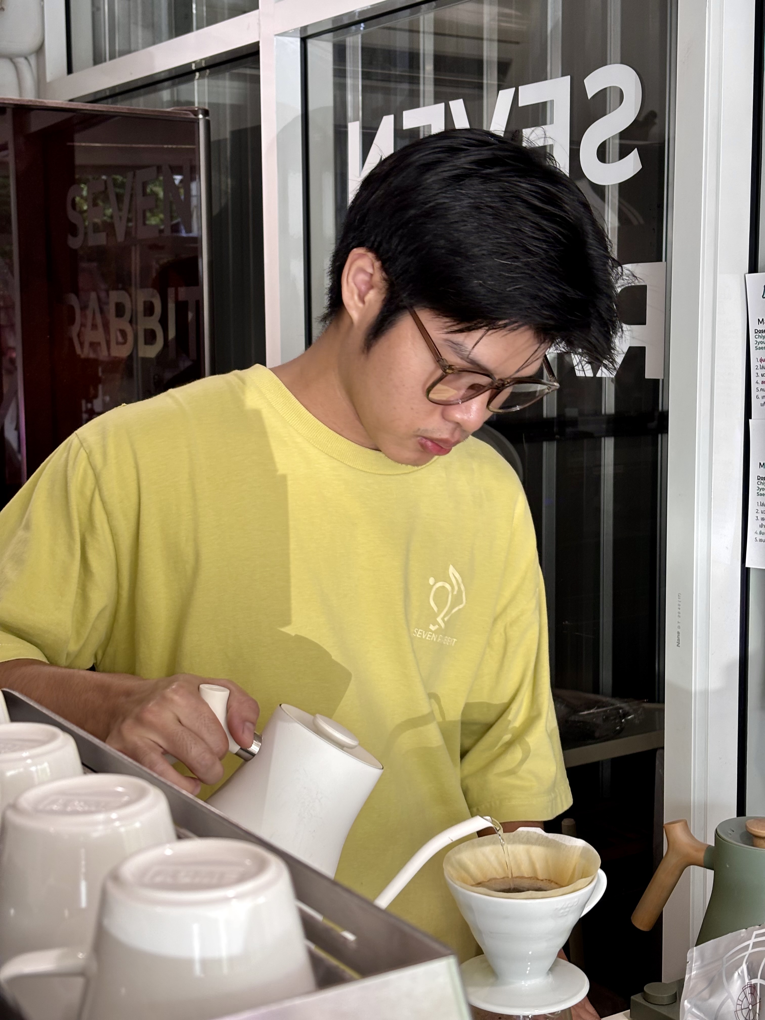 Barista pouring a filter coffee